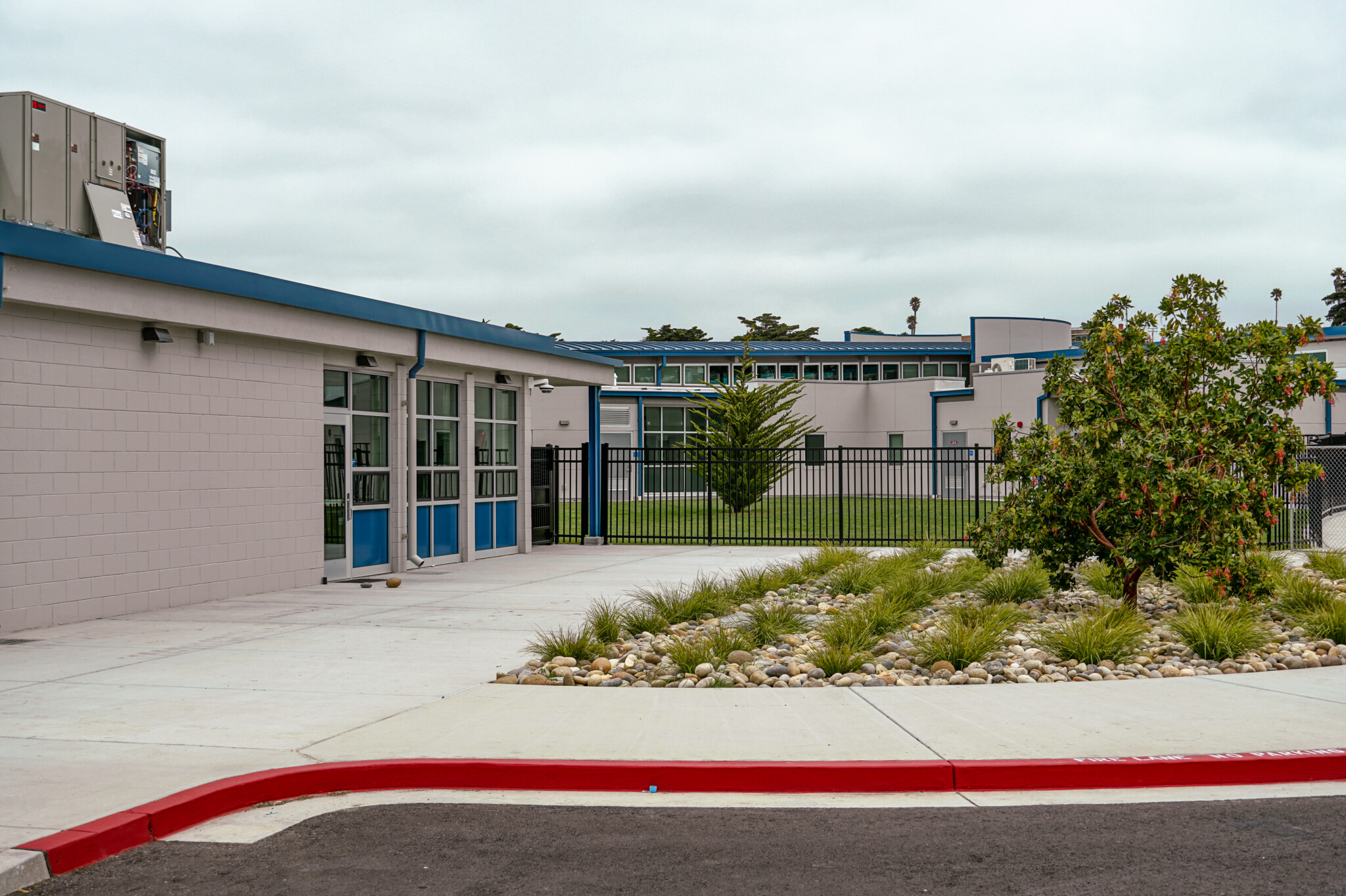 Students at Shell Beach Elementary admire artwork on the newly opened Multipurpose Room